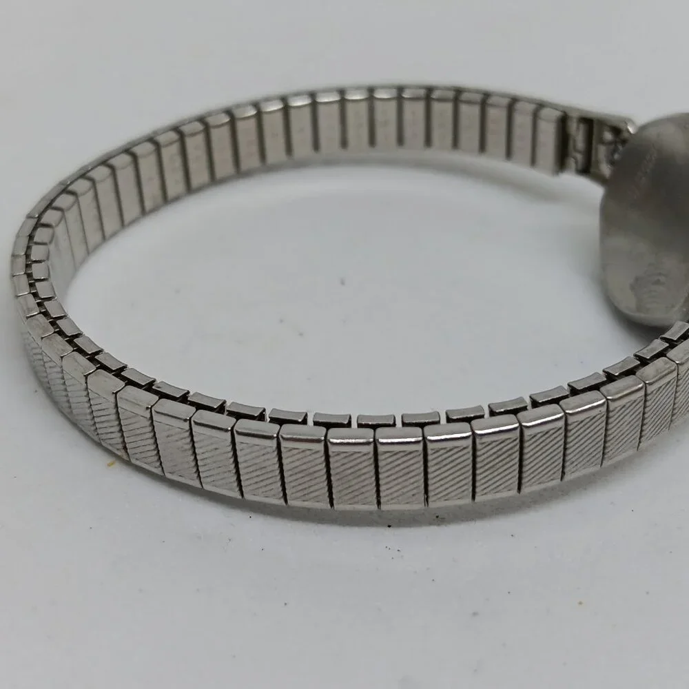 VINTAGE Timex 348 Manual Wind Women's 17mm Silver Tone Flex Band Watch